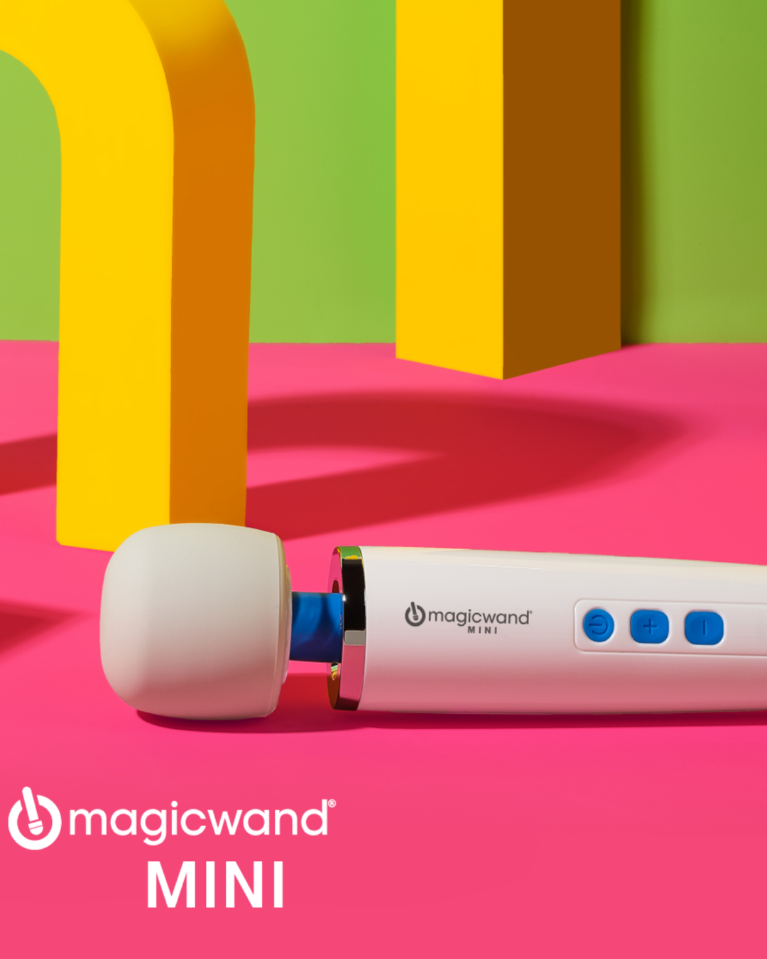 Magic Wand Mini Wand Vibrator (The Hitachi Magic Wand) on pink andyellow background