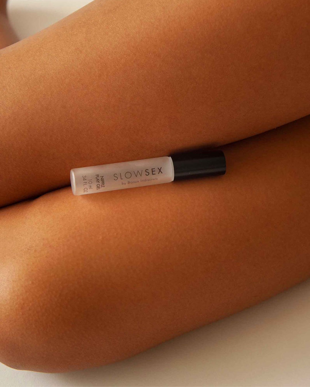 Bijoux Indiscrets Slow Sex Nipple Play Gel Between Model's Thighs