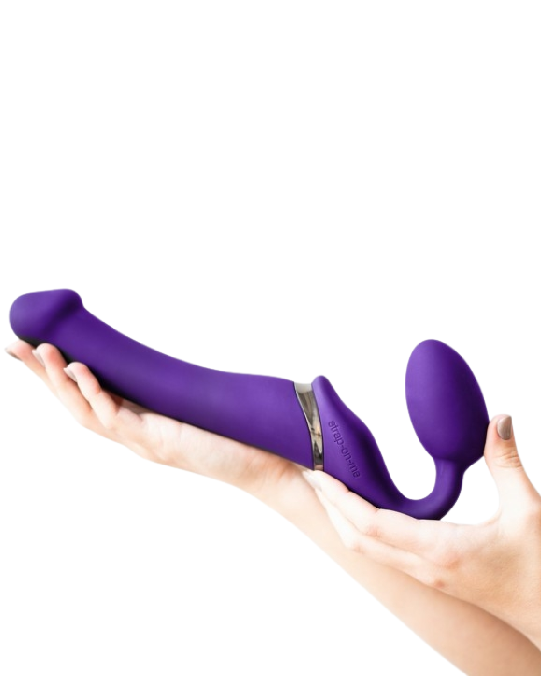 Lovely Planet Vibrating Strapless Strap On Purple- X Large in model's hand