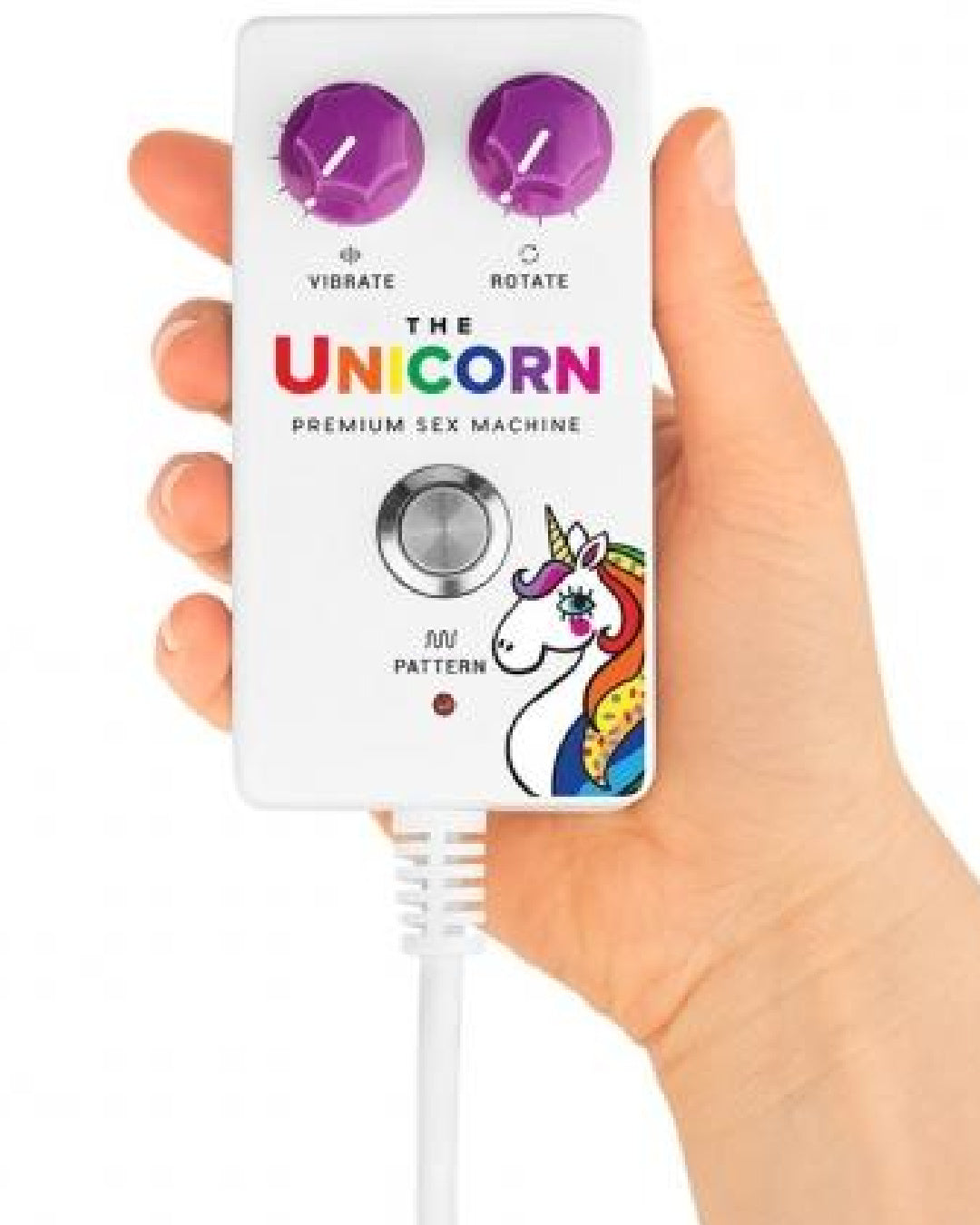 The Cowgirl Unicorn Premium Sex Machine remote held in model's hand