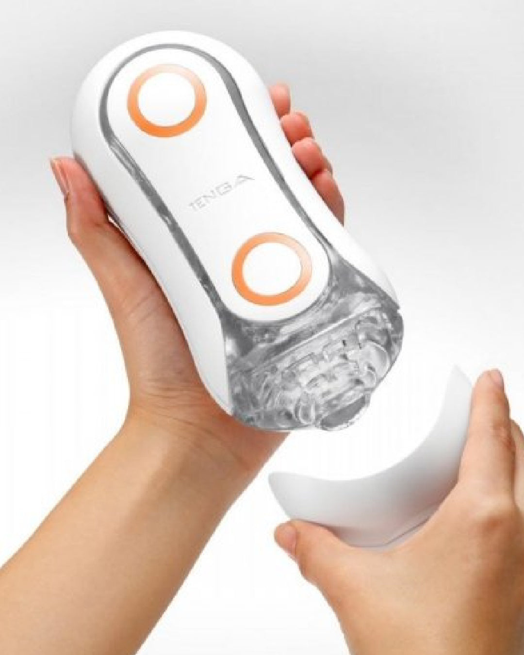 Tenga Flip Orb Penis Masturbator - Orange Crash held in hands with the lid off