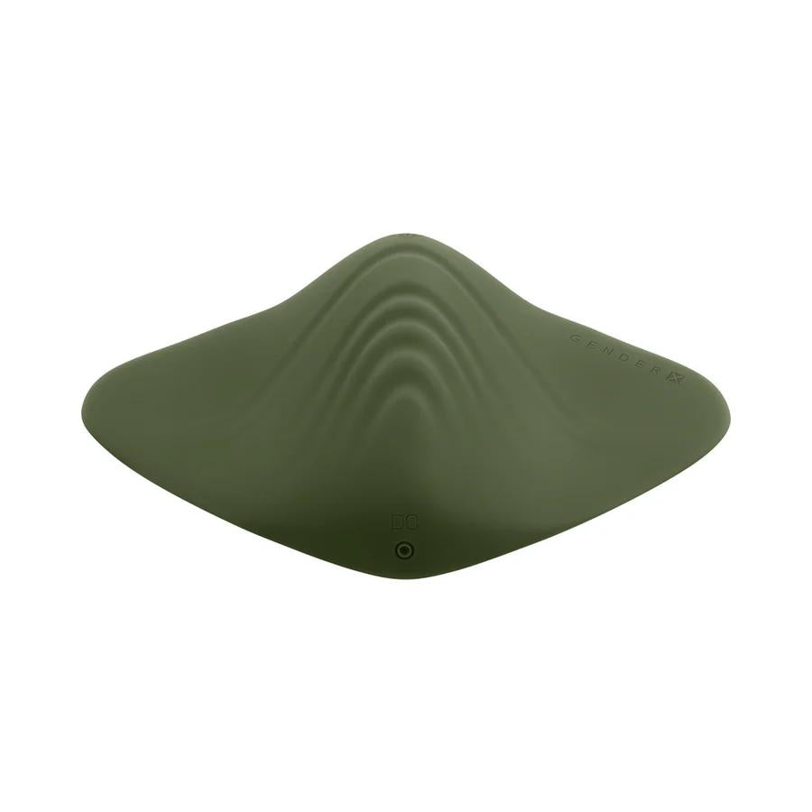 The Gender X Pleasure Pad Rechargeable Grinding Pad & Stroker is a green, smooth silicone insert with a wave-like, contoured design and "GENDER X" embossed on the upper right side.