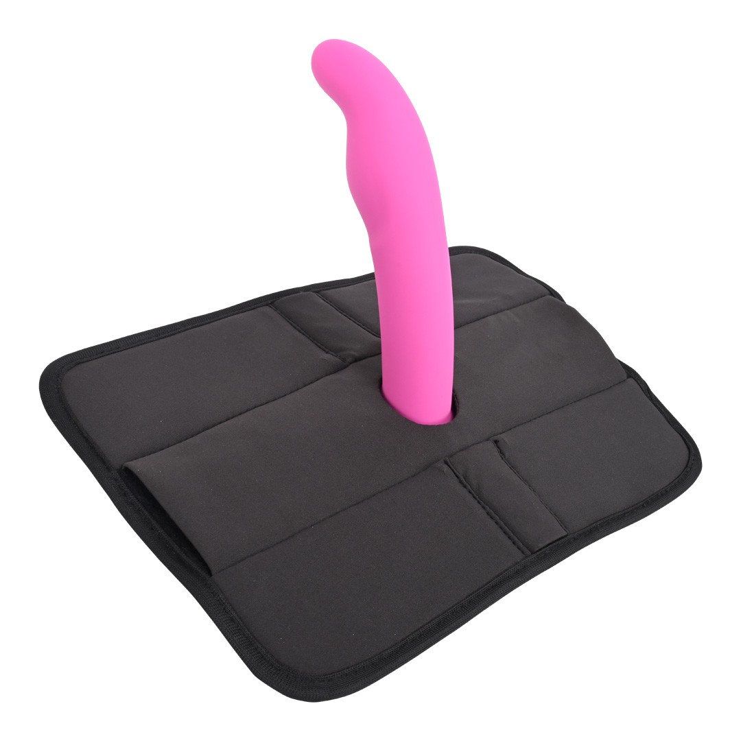 Pink silicone Pivot 3 in 1 Play Pad Toy Mount on a black carrying case by Sportsheets.