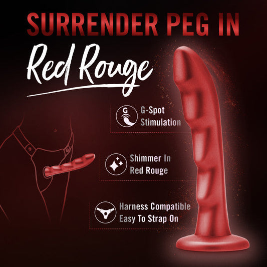 A red, rippled silicone dildo designed for G-spot stimulation is pictured. It includes a shimmer effect and is harness compatible for effortless strap-on play. The text above reads "Jealousy 7 Inch Rippled Silicone Dildo by Blush in Red Rouge.