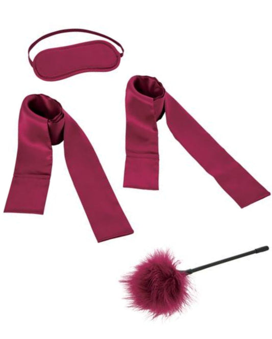 Sex & Mischief Enchanted Bondage Starter Kit - Red laid out on a white background