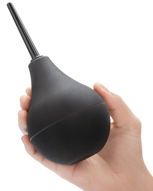 B-Vibe Classic Enema model holding it 