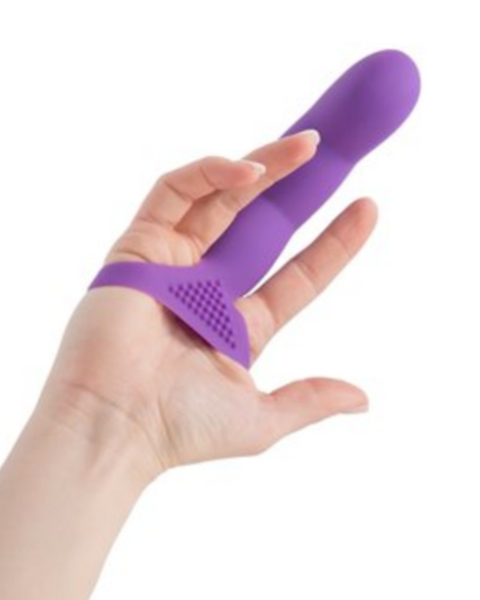 Simple and True Extra Touch Silicone G-Spot Finger Extender - Purple worn on a person's hand and middle finger with the palm turned towards the camera