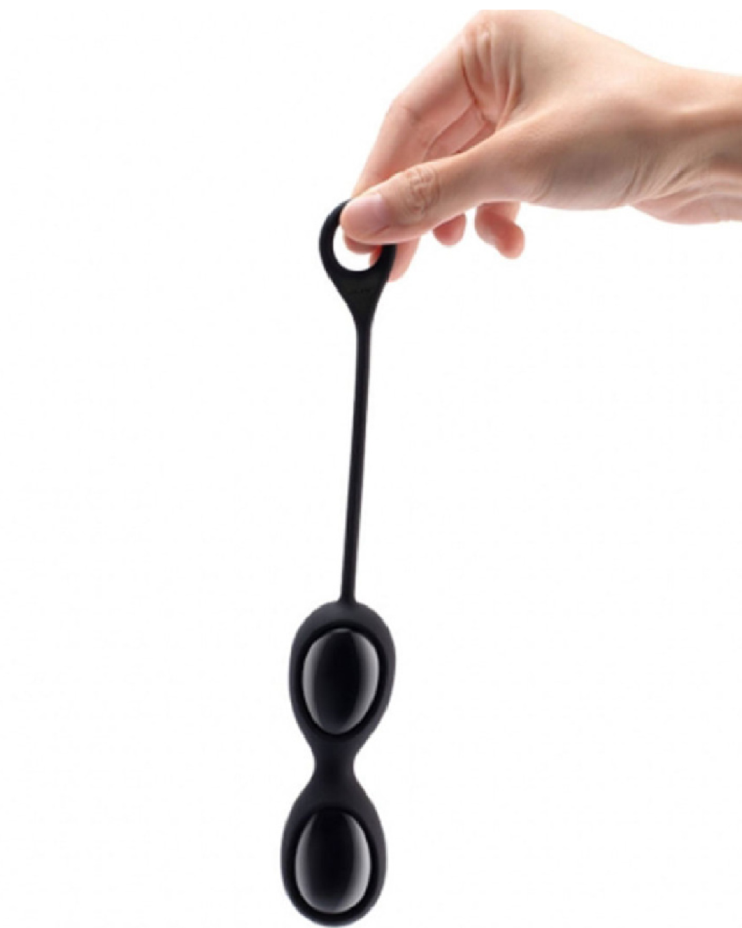 Le Wand Crystal Yoni Eggs - Black Obsidian in silicone casing held in model's hand