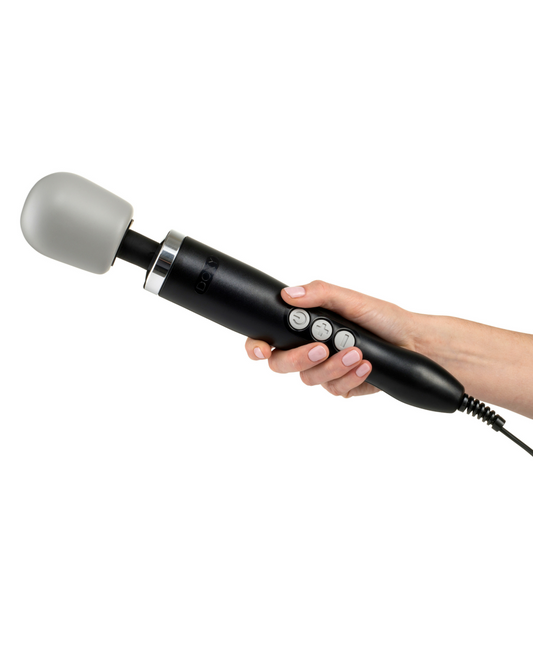 Doxy Extra Powerful Massage Wand Vibrator - Black wand in model's hand 