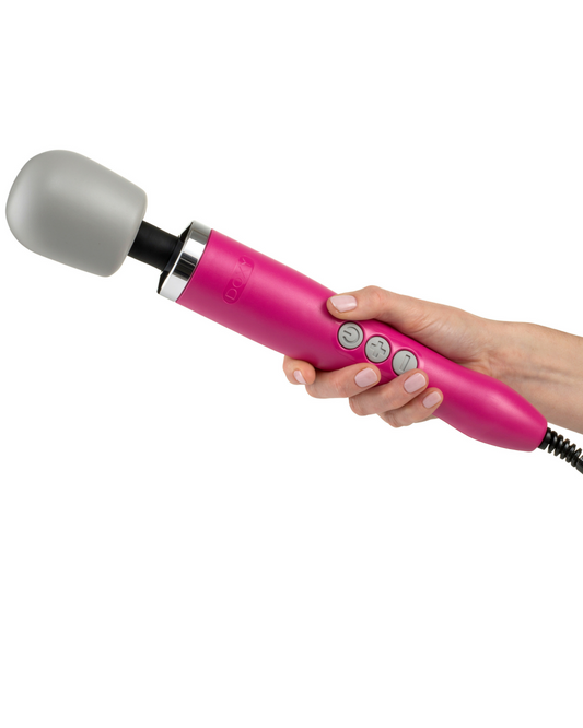 Pink Doxy Massager Wand held in model's hand 