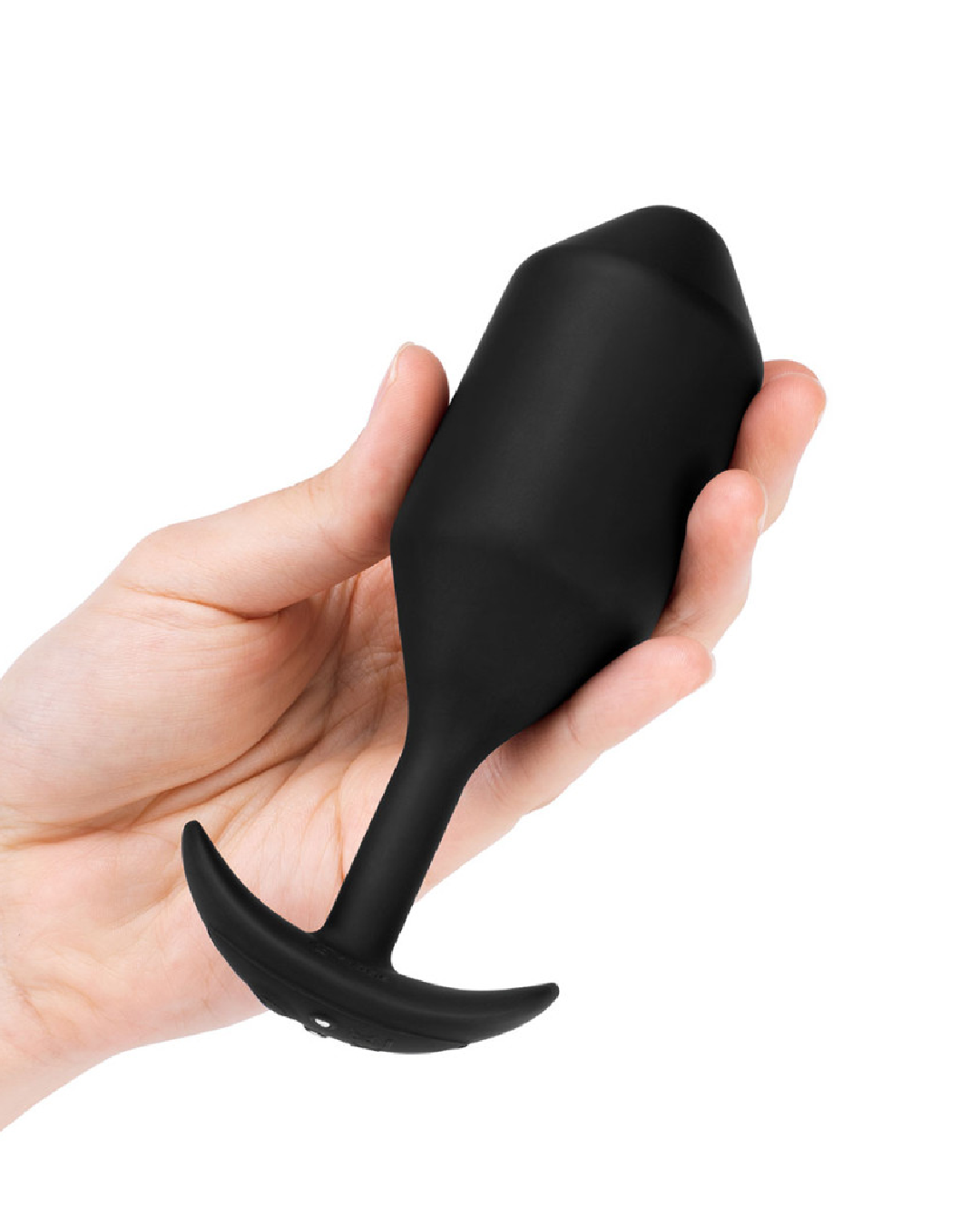 B-Vibe Vibrating Snug Plug 5 (XXL) - Black held in a hand