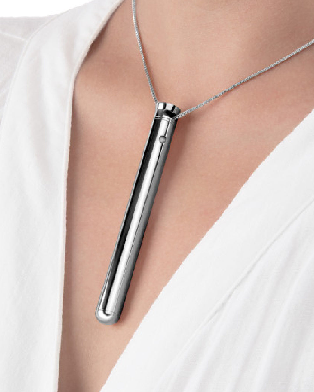 Le Wand Vibrating Necklace - Silver around model's neck 