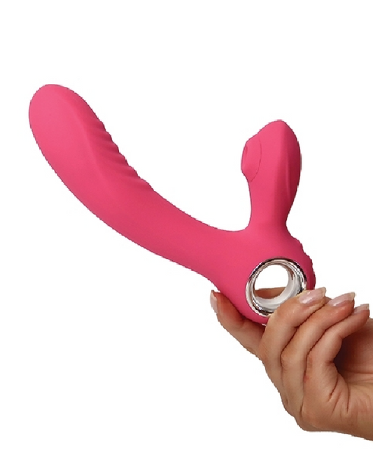 Beso G Warming Clitoral Suction & G-Spot Vibrator - Pink held in a person's hand side view to illustrate the arm