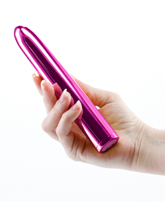 Chroma Insertable Beginner Bullet Vibrator - Pink in hand 