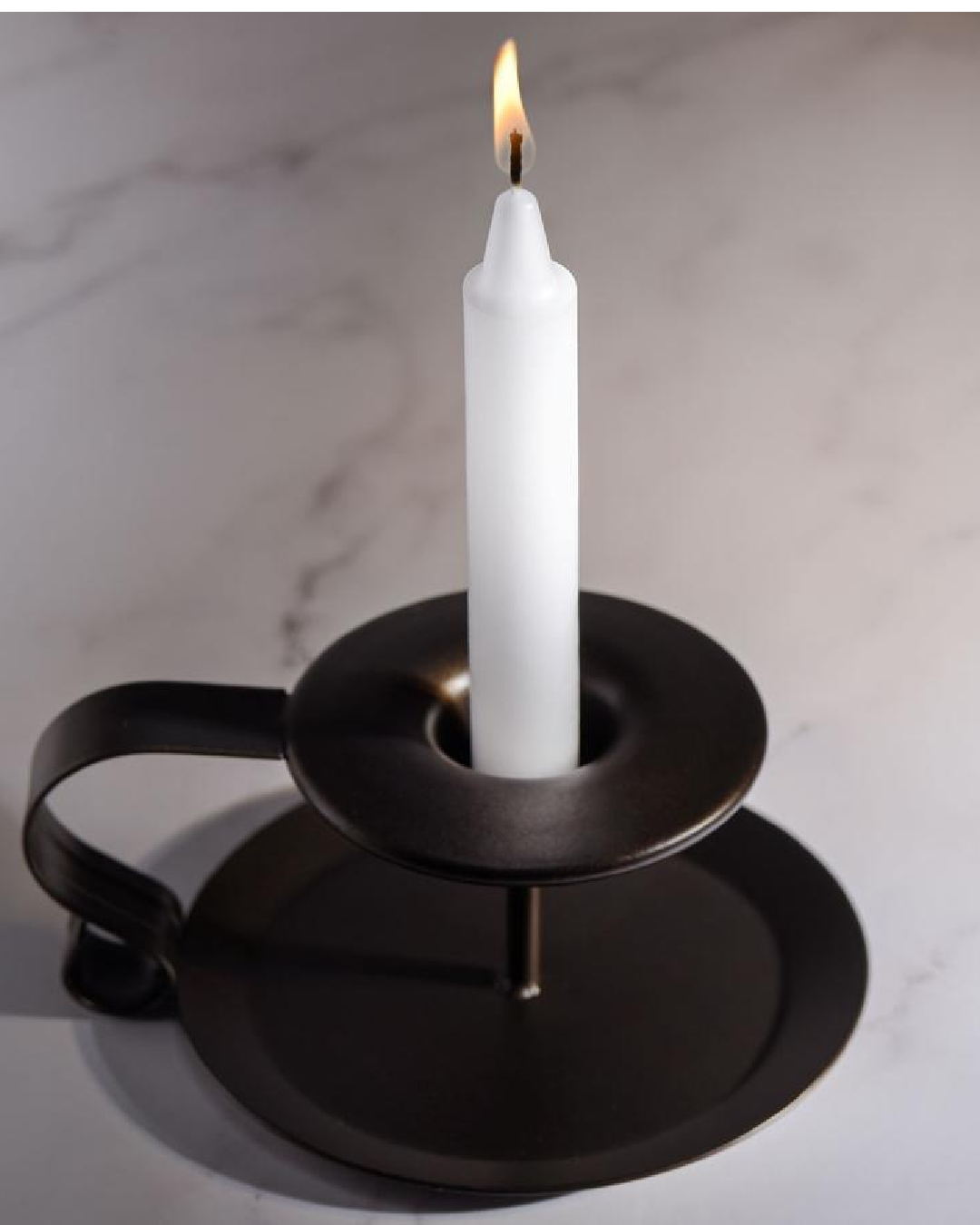 Lacire Drip Pillar Massage Candles - White  in black candle holder 