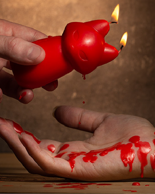 Temptasia Fox Drip Candle - Red dripping onto skin