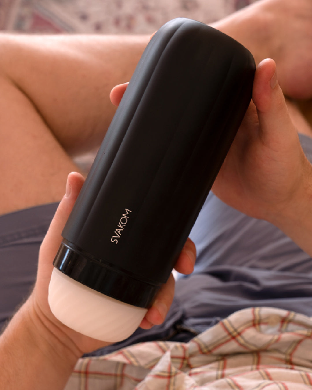Sam Neo Suction & Vibration Interactive App Controlled Masturbator held in a hand